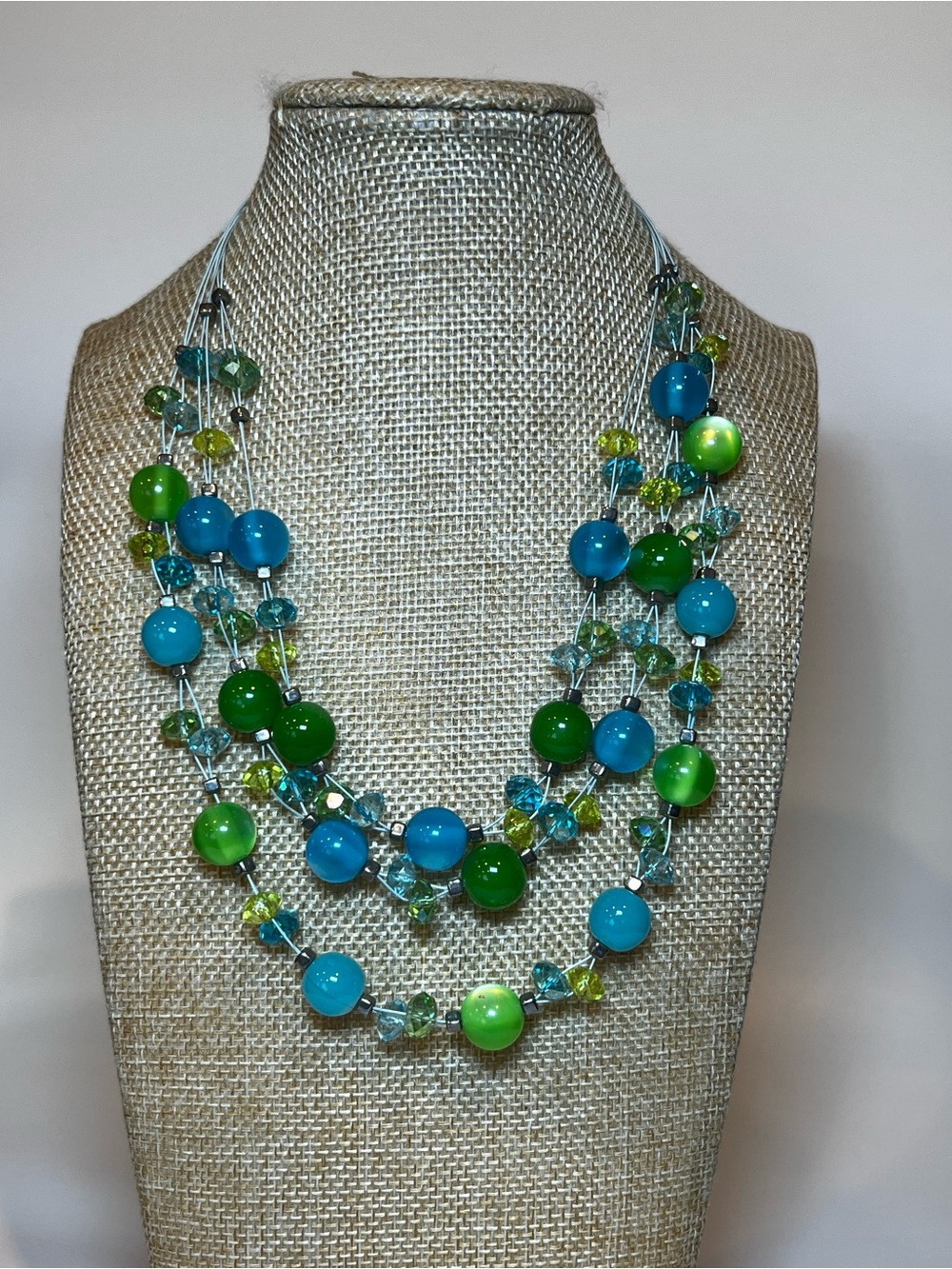 Multi-strand floating aquatic color palette lucite crystal boho wired necklace